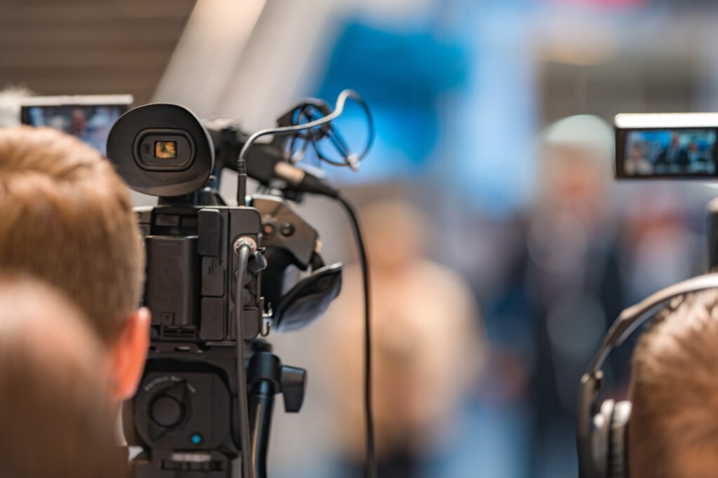 Camera at a Live Media Conference.
